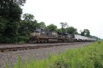 NS 9565 with an intermodal train heading West